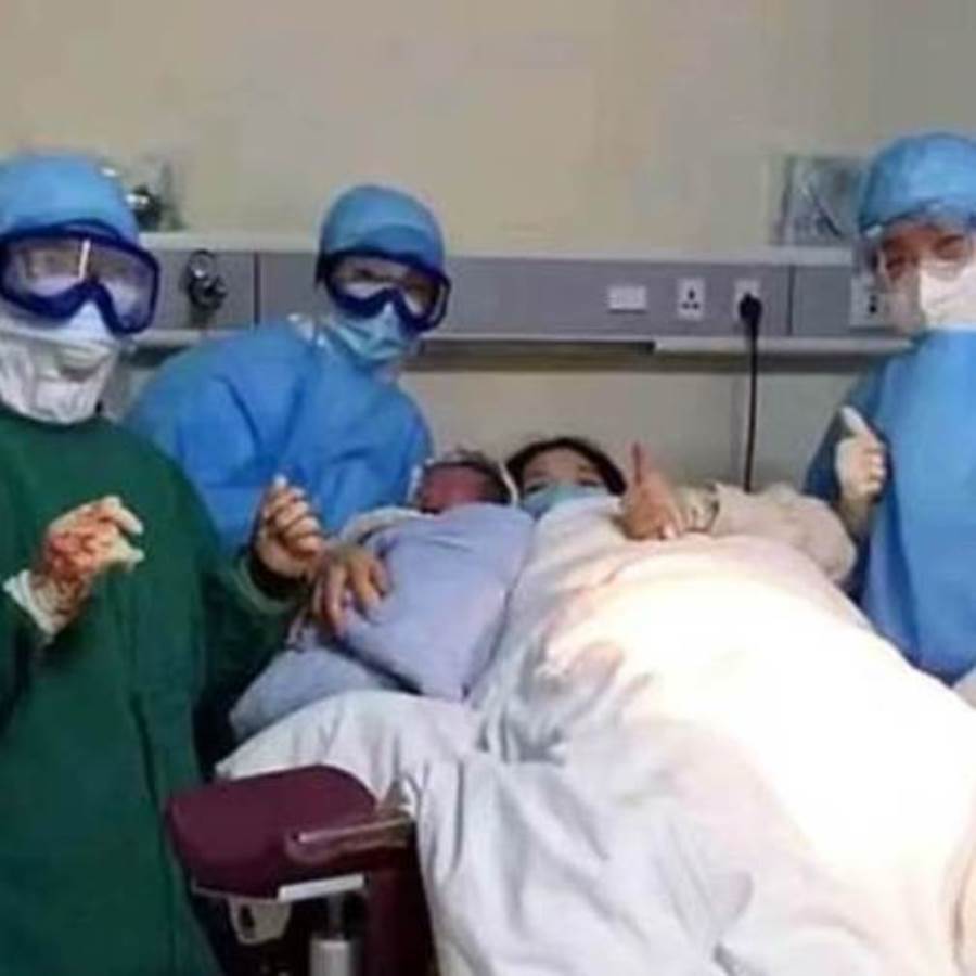 بالصور .. أول ولادة داخل الحجر الصحي في ووهان منبع الكورونا