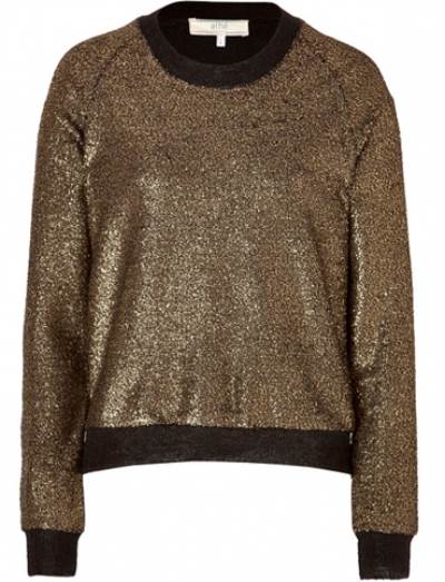 بلوزات ميتاليك لفترة النهار أناقة هذا الموسم