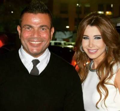  بالصور .. عمرو دياب ونانسي عجرم يشعلان مهرجان التسوق في دبي