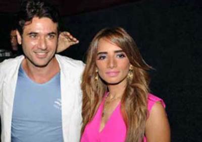 زينة تسخر من أحمد عز وتصف من حوله بـ "الزبالة"