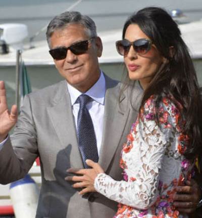 جورج كلوني وأمل علم الدين يتبنيان طفل سوري