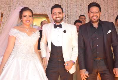 حماقى يشعل زفاف محمد ونورهان