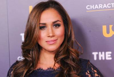 ميجان ماركل تكشف عن إسم مصممة فستانها