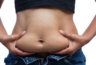 لهذا السبب قد تعانين من "الكرش" حتى مع الريجيم