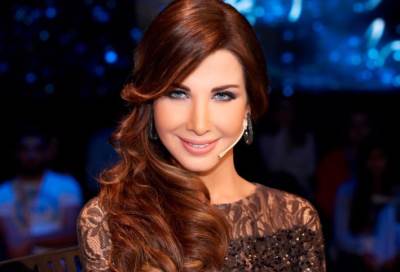 بعد الانذار القانوني .. الكشف عن تفاصيل أزمة أغنية نانسي عجرم