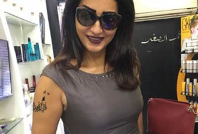 وفاء عامر تحذف صورة "التاتو" الجديد بعد غضب جمهورها