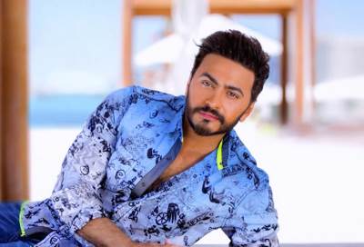 ردّ صادم من تامر حسني على الساخرين من صورته القديمة