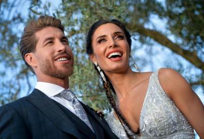 بالصور .. زوجة راموس ترتدي فستان زفاف بتصميم عربى .. وباقة ورد سوداء