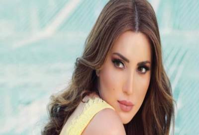 شاهد .. نسرين طافش بـ البيجامة برفقة قطتها