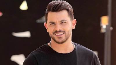 هل يوجه محمد رشاد أغنيته الجديدة لطليقته مى حلمى؟