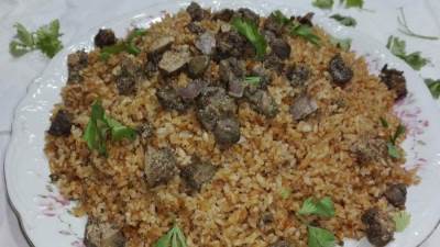 طريقة عمل الأرز بالكبد والقوانص بخطوات بسيطة بمذاق لا يقاوم..!