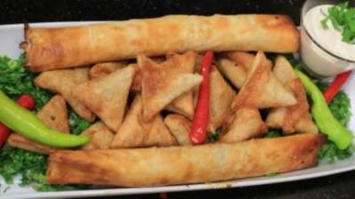 طرق عمل سمبوسك بيتزا شهية عبر خطوات بسيطة وسريعة