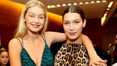 جيجى وبيلا حديد تألقتا بعرض أزياء فيرساتشى فى أسبوع موضة ميلان