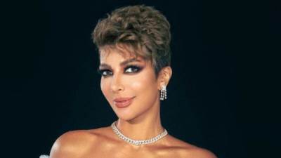 أصالة تخلع حذائها على المسرح بحفلها بالإمارات .. لهذا السبب