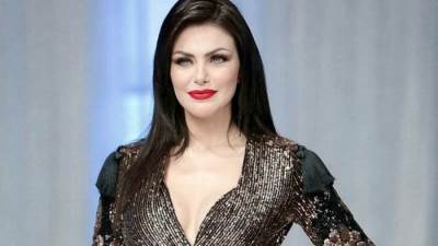  دارين حداد تخطف أنظار متابعيها بالأحمر الناري 