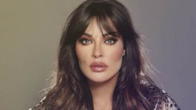 نادين نجيم تسمتع بالثلج برفقة أبنائها