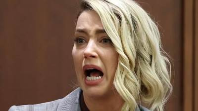 صور.. انهيار أمبرد بعد رفض طلب إسقاط حكم التعويضات لصالح جونى ديب