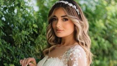 ملك أحمد زاهر بإطلالة العروس في أحدث جلسة تصوير